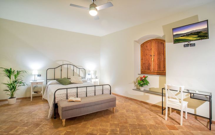 Imagen de la habitación del Torrenova di Assisi Country House. Foto 11