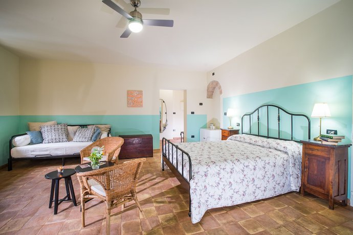 Imagen de la habitación del Torrenova di Assisi Country House. Foto 12