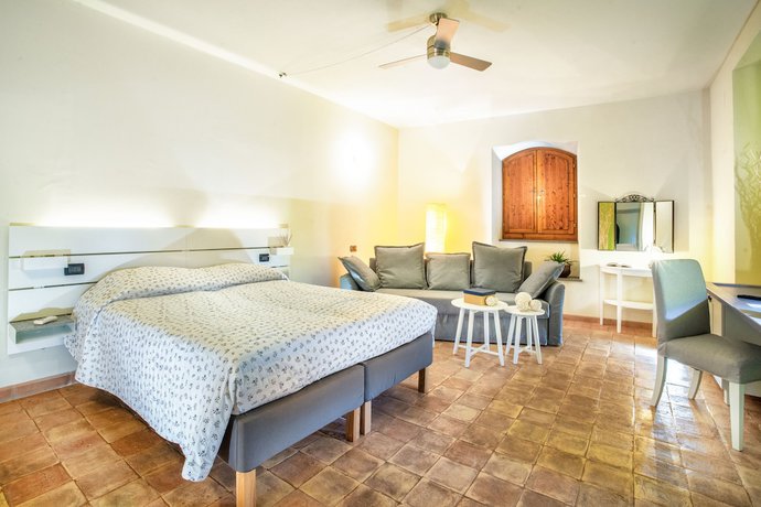 Imagen de la habitación del Torrenova di Assisi Country House. Foto 17