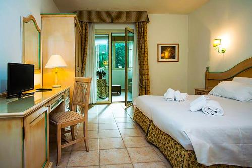 Imagen de la habitación del Toscana Wellness Resort. Foto 18