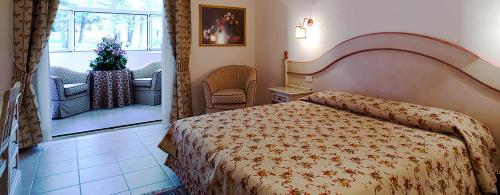 Imagen de la habitación del Toscana Wellness Resort. Foto 19