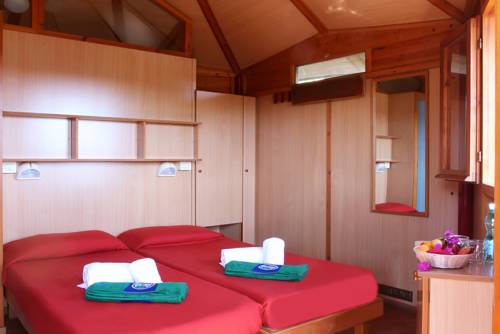 Imagen de la habitación del Touring Club Italiano - La Maddalena. Foto 4