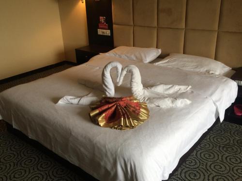 Imagen de la habitación del Towo Holiday Hotel(dujiangyan). Foto 1