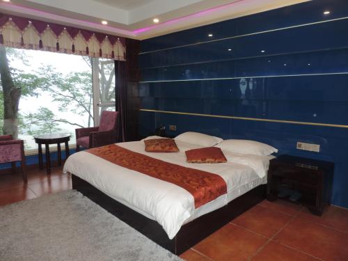 Imagen de la habitación del Towo Toppin Hotel Emeishan Linggongli. Foto 2