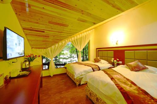 Imagen de la habitación del Towo Topping Hotel (emeishan Wannian Temple). Foto 3