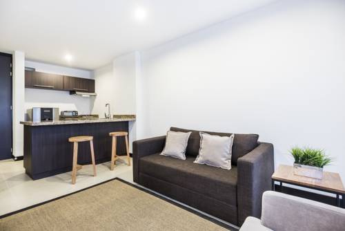 Imagen de la habitación del Travelers Rio Verde Living Suites. Foto 2