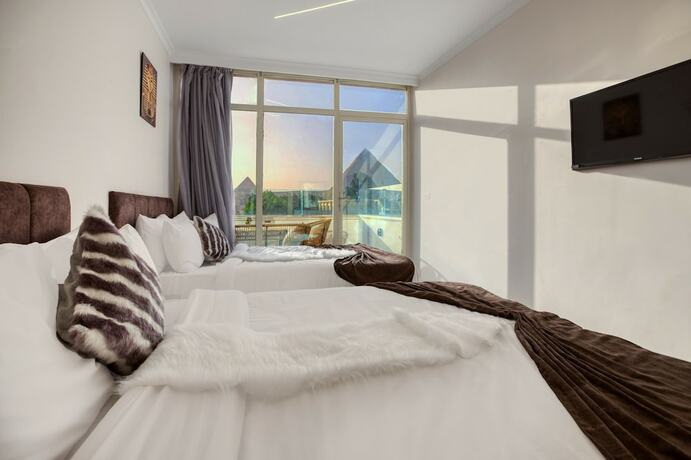 Imagen general del Tree Lounge Pyramids View INN, Sphinx Giza.. Foto 10