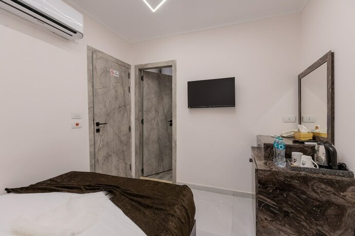 Imagen de la habitación del Tree Lounge Pyramids View INN, Sphinx Giza.. Foto 11