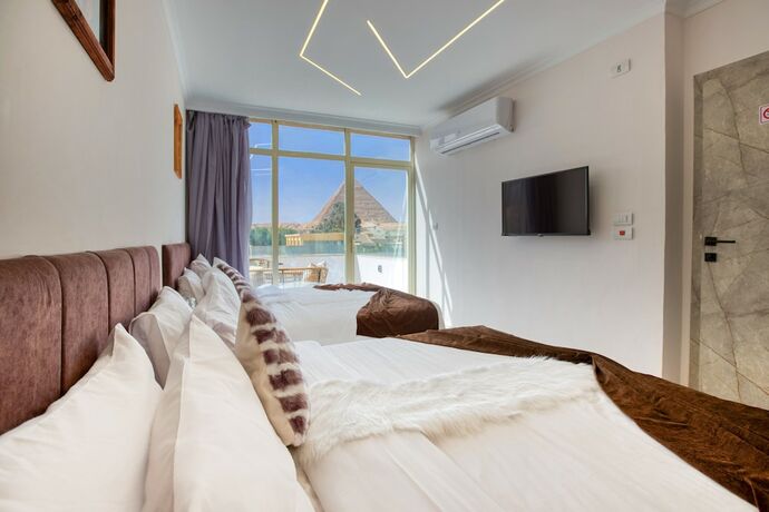 Imagen de la habitación del Tree Lounge Pyramids View INN, Sphinx Giza.. Foto 15