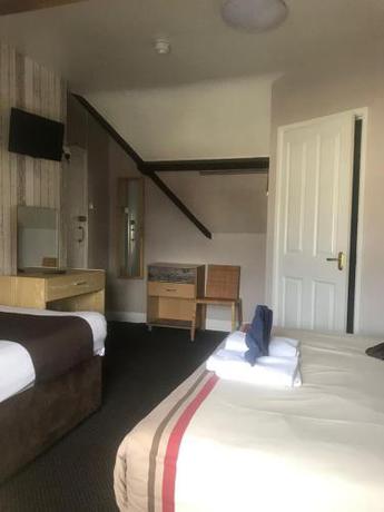 Imagen de la habitación del Tregonholme Hotel. Foto 7