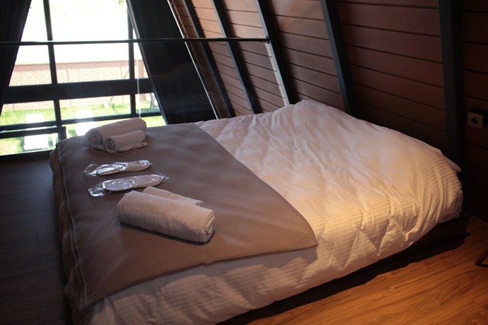 Imagen de la habitación del Triangle Life Suit. Foto 10