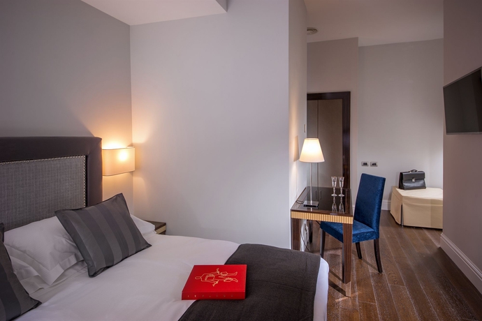 Imagen de la habitación del Tridente Suites. Foto 9