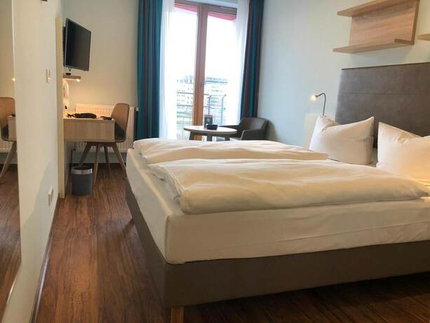 Imagen de la habitación del Trip Inn Residence City Center. Foto 12