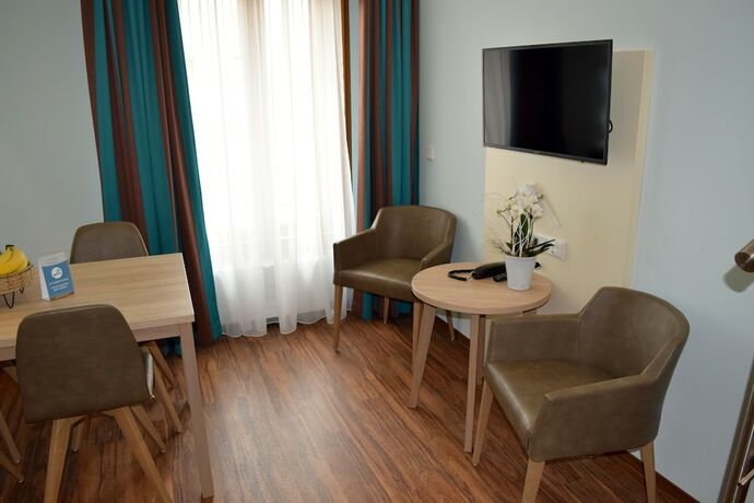 Imagen de la habitación del Trip Inn Residence City Center. Foto 19