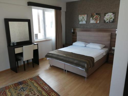 Imagen de la habitación del Troas Beach Hotel. Foto 6