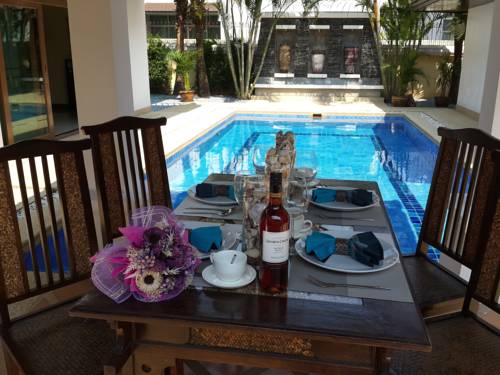 Imagen de la habitación del Tropicana Pool Villa. Foto 15