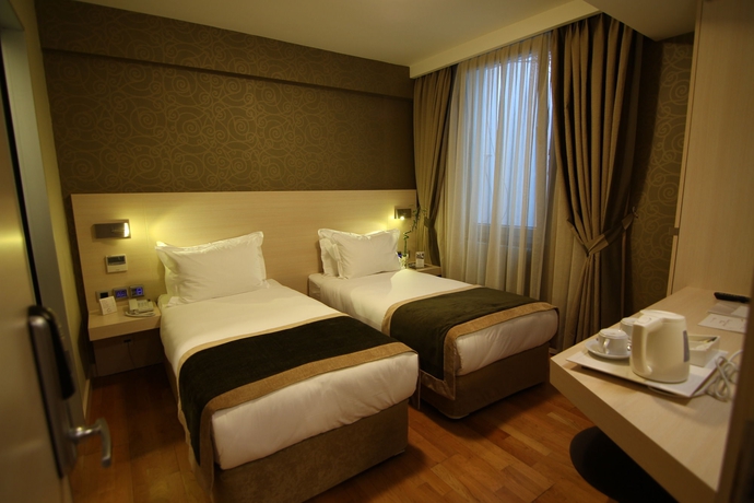 Imagen de la habitación del Troya Hotel. Foto 11