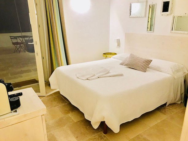 Imagen de la habitación del Trulli Le Icone. Foto 17