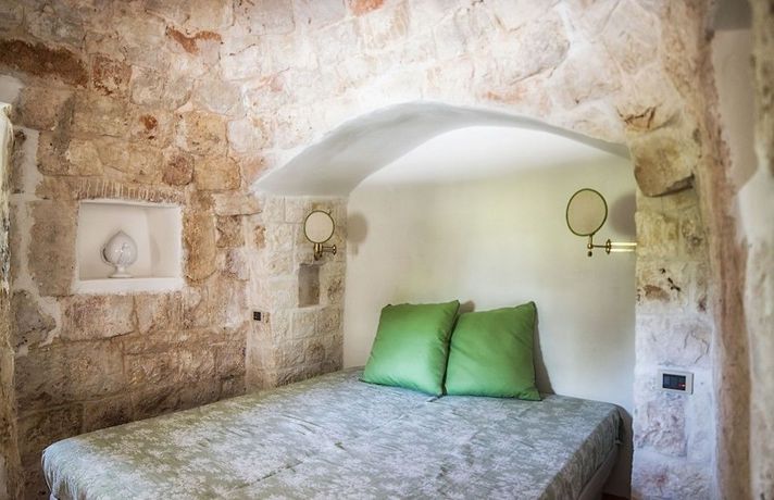 Imagen de la habitación del Trulli Le Icone. Foto 18