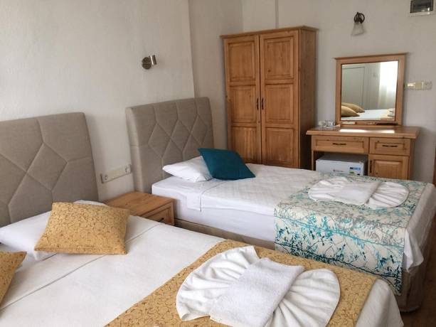 Imagen de la habitación del Tugay Hotel. Foto 8