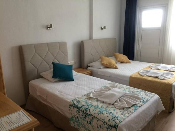 Imagen de la habitación del Tugay Hotel. Foto 11