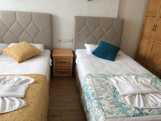 Imagen de la habitación del Tugay Hotel. Foto 13