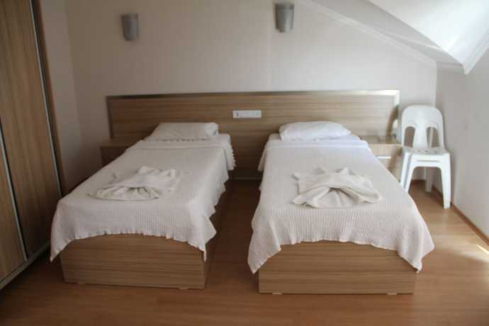 Imagen de la habitación del Tugay Hotel. Foto 15
