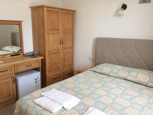Imagen de la habitación del Tugay Hotel. Foto 17