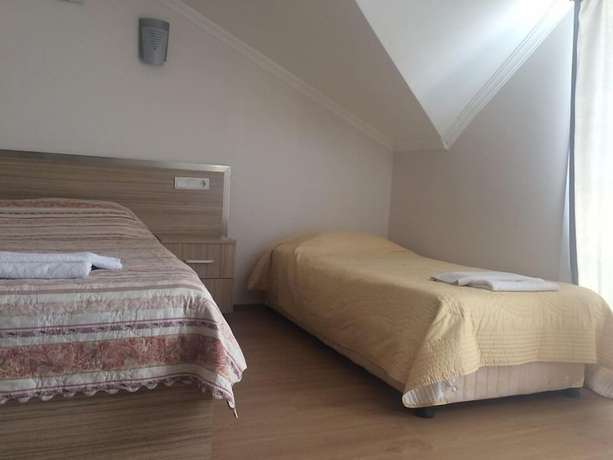 Imagen de la habitación del Tugay Hotel. Foto 19