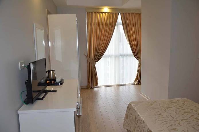 Imagen de la habitación del Tugra Hotel. Foto 10