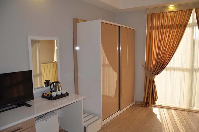 Imagen de la habitación del Tugra Hotel. Foto 11