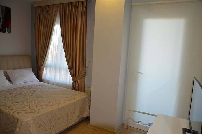 Imagen de la habitación del Tugra Hotel. Foto 14