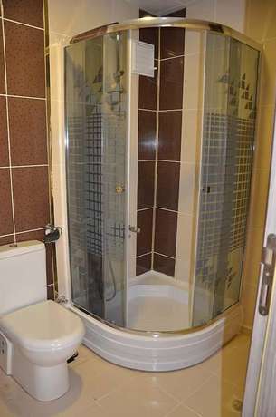 Imagen de la habitación del Tugra Hotel. Foto 16