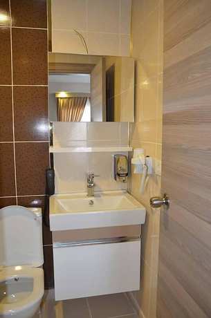 Imagen de la habitación del Tugra Hotel. Foto 18