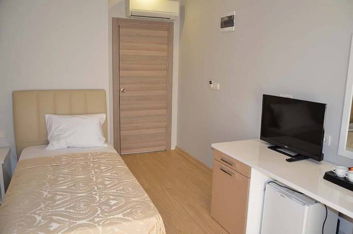 Imagen de la habitación del Tugra Hotel. Foto 19