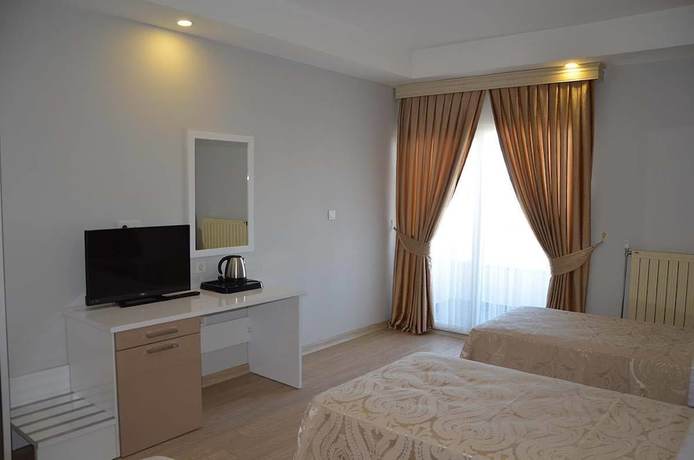 Imagen de la habitación del Tugra Hotel. Foto 20