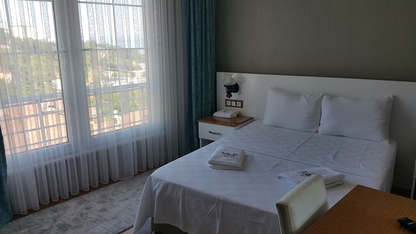 Imagen de la habitación del Tulipa Suites. Foto 12