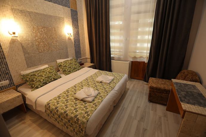 Imagen de la habitación del Tulpar Hotel. Foto 4