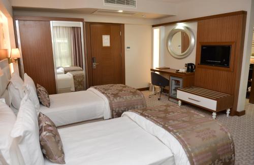 Imagen de la habitación del Tuna Otel Rezi̇dans. Foto 3