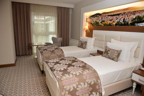 Imagen de la habitación del Tuna Otel Rezi̇dans. Foto 7
