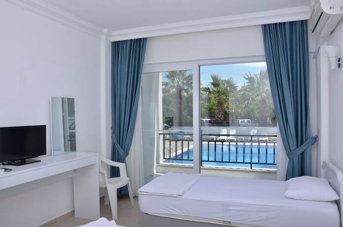 Imagen de la habitación del Tunan Motel. Foto 20