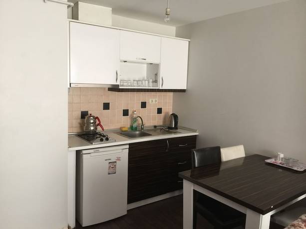 Imagen de la habitación del Tuyap Apartments. Foto 6