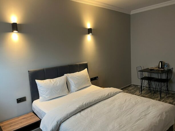 Imagen de la habitación del Tuzla Grand. Foto 7