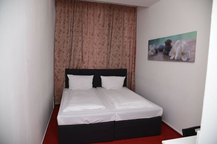 Imagen de la habitación del Twinhof. Foto 16