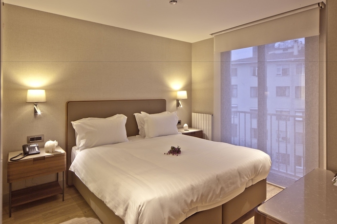 Imagen de la habitación del Tzl Suites. Foto 3