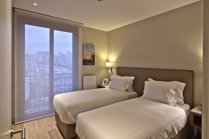 Imagen de la habitación del Tzl Suites. Foto 6