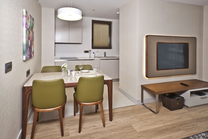 Imagen de la habitación del Tzl Suites. Foto 7