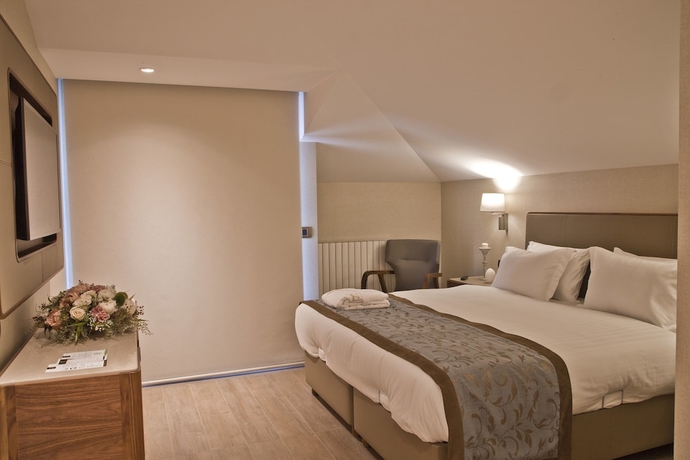 Imagen de la habitación del Tzl Suites. Foto 8