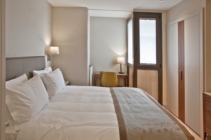 Imagen de la habitación del Tzl Suites. Foto 11