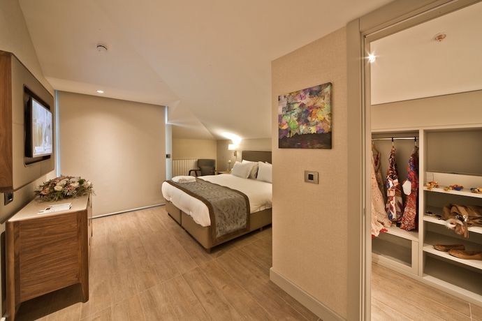 Imagen de la habitación del Tzl Suites. Foto 12